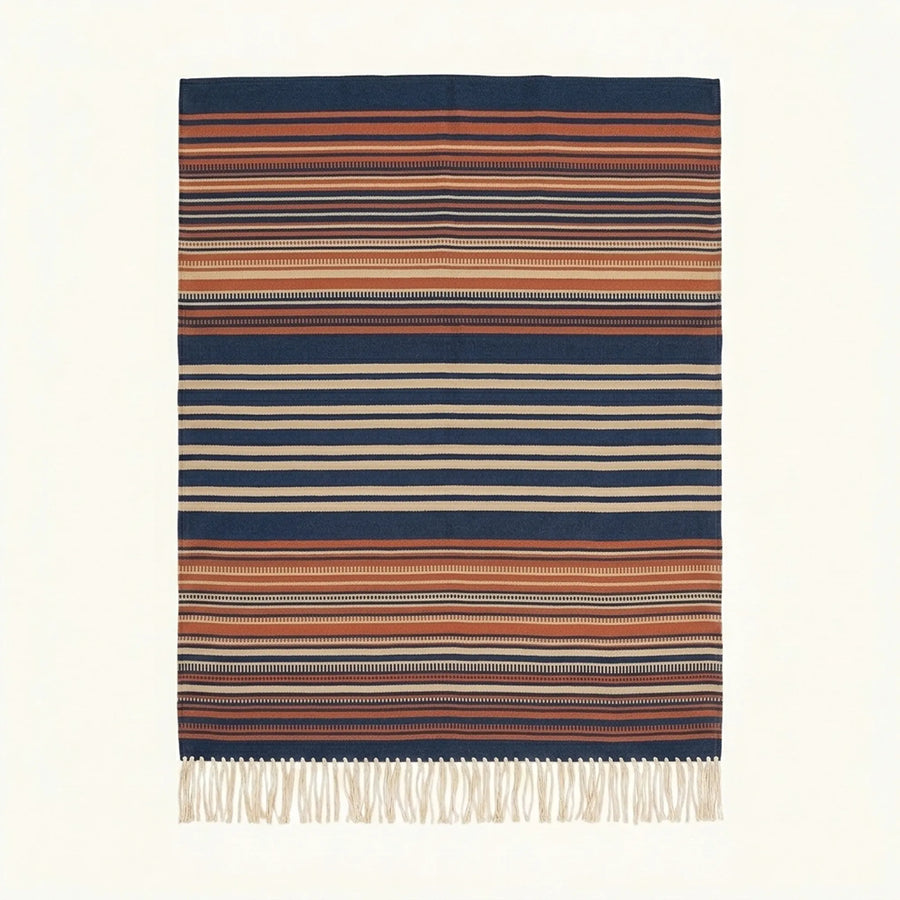 Navy Zanafi Kilim rug Ounila with layered rust and ivory stripes, full rug view