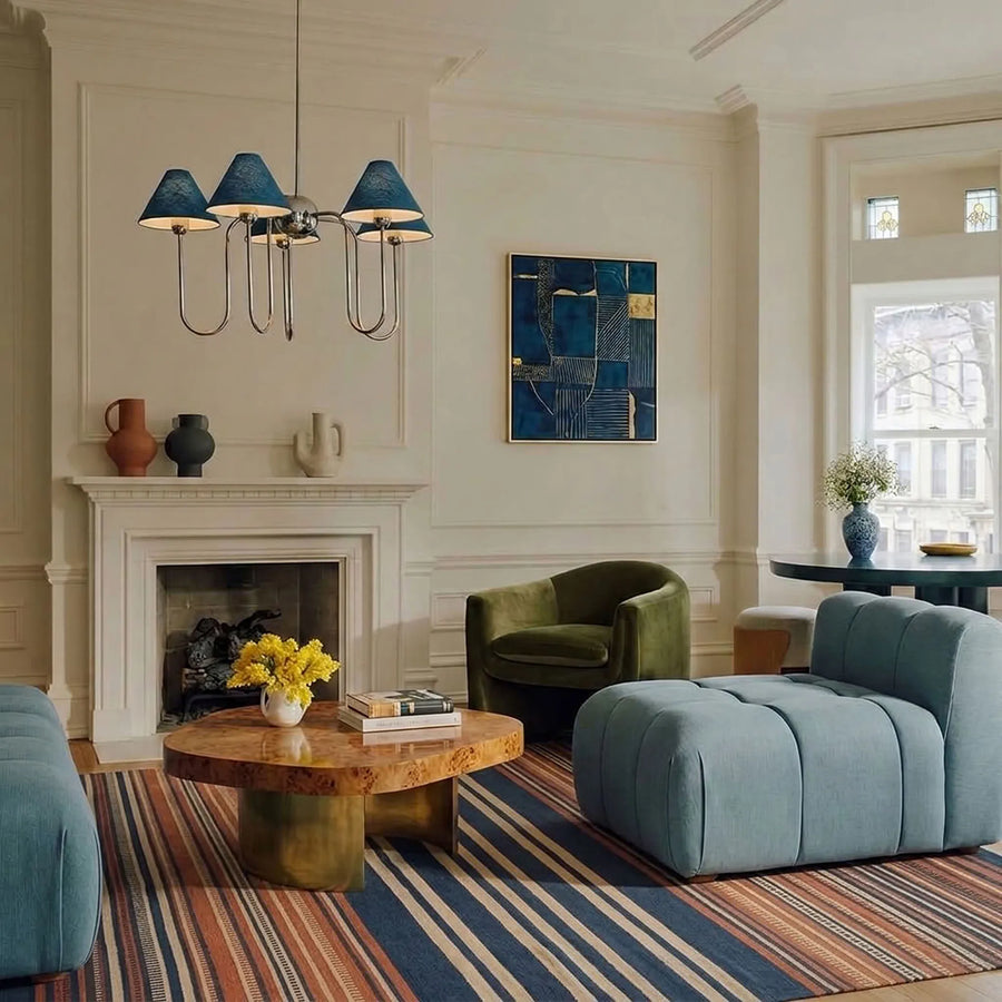 Navy Zanafi Kilim rug Ounila with layered stripes, lifestyle living room view
