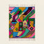 Full view of the Iderfan Boujaad rug in pink, mustard, teal, green and burgundy with jagged abstract patchwork forms