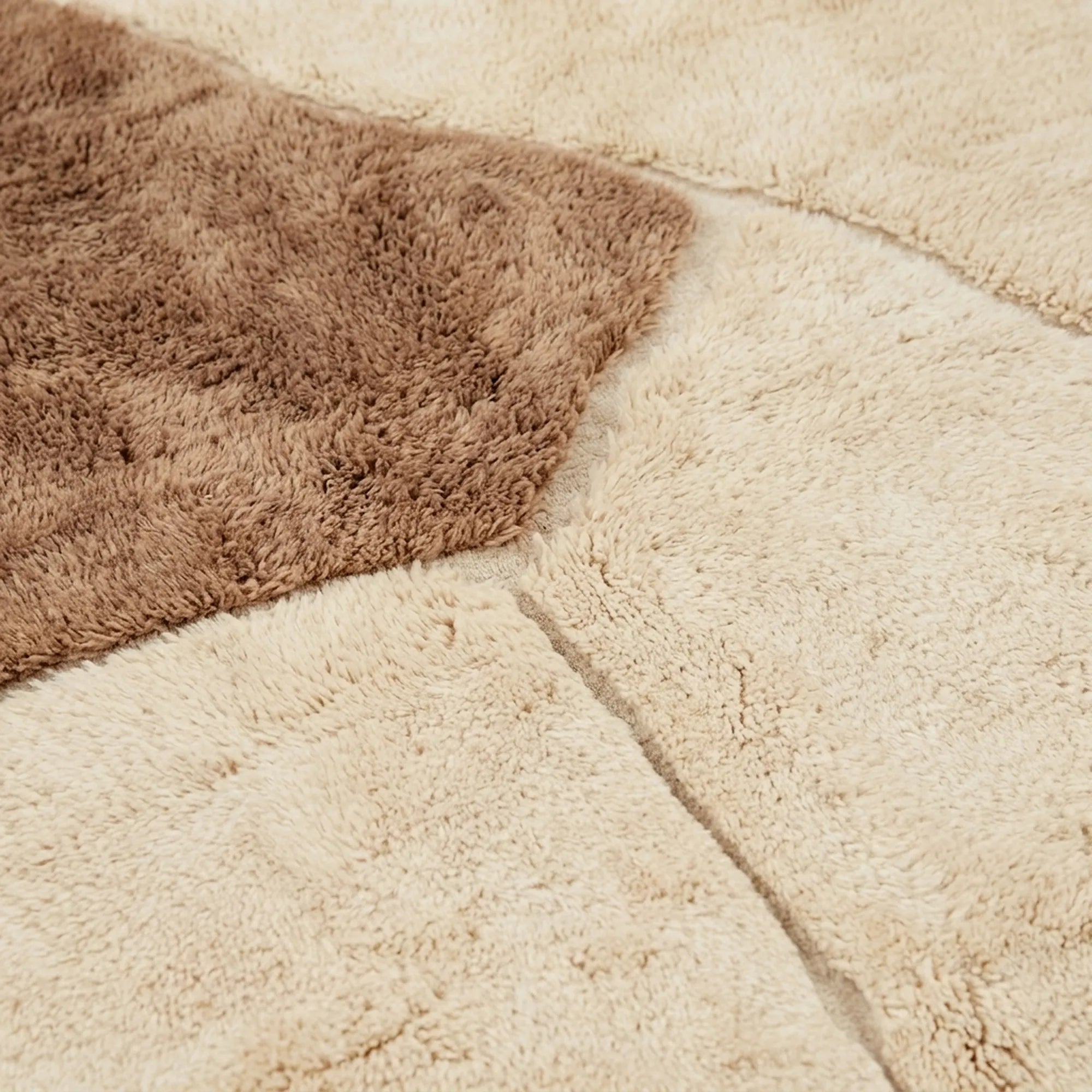 Ivory & Taupe Mrirt rug Imzran, abstract stone forms raised pile detail