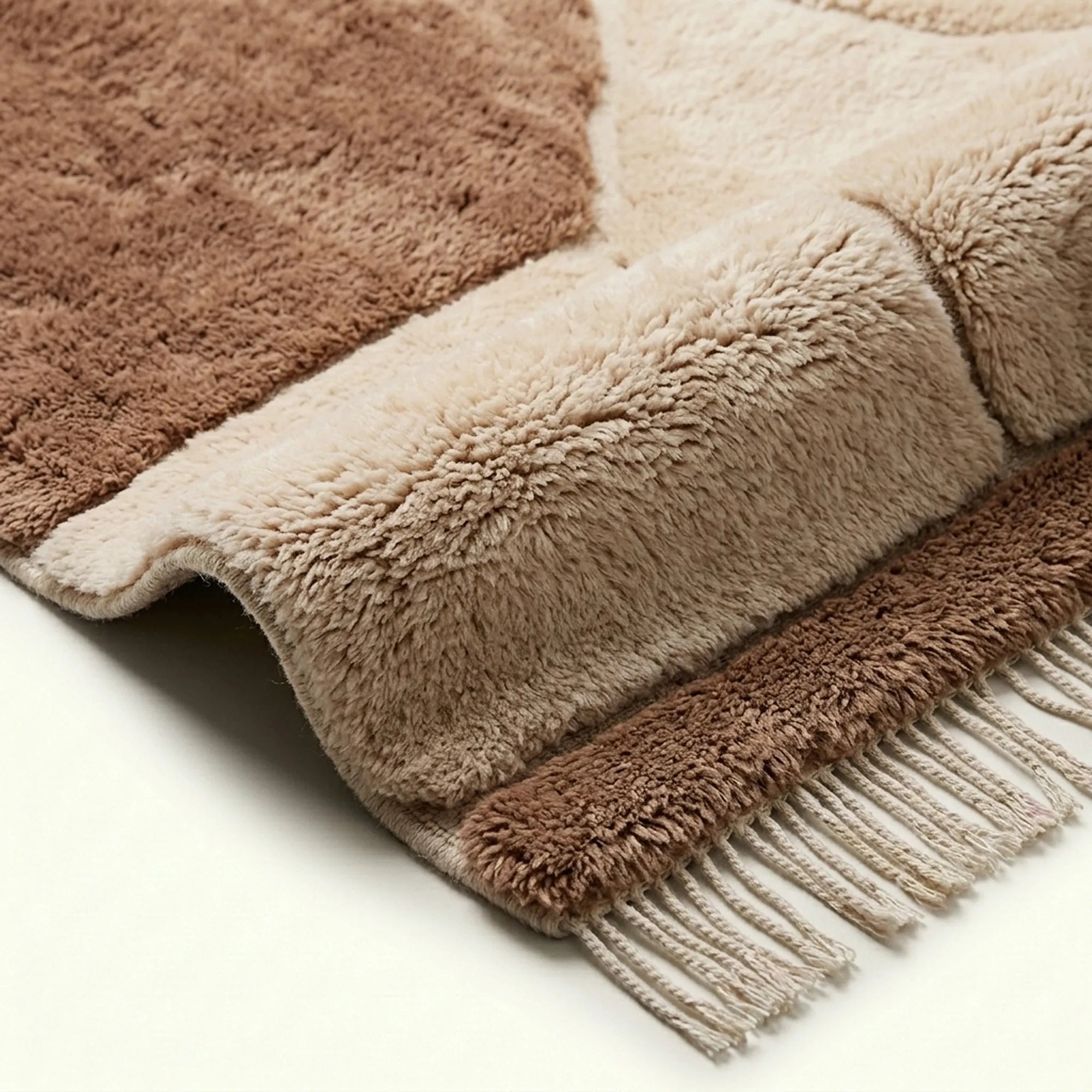 Ivory & Taupe Mrirt rug Imzran, abstract stone forms edge detail