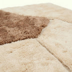 Ivory & Taupe Mrirt rug Imzran, abstract stone forms fringe detail