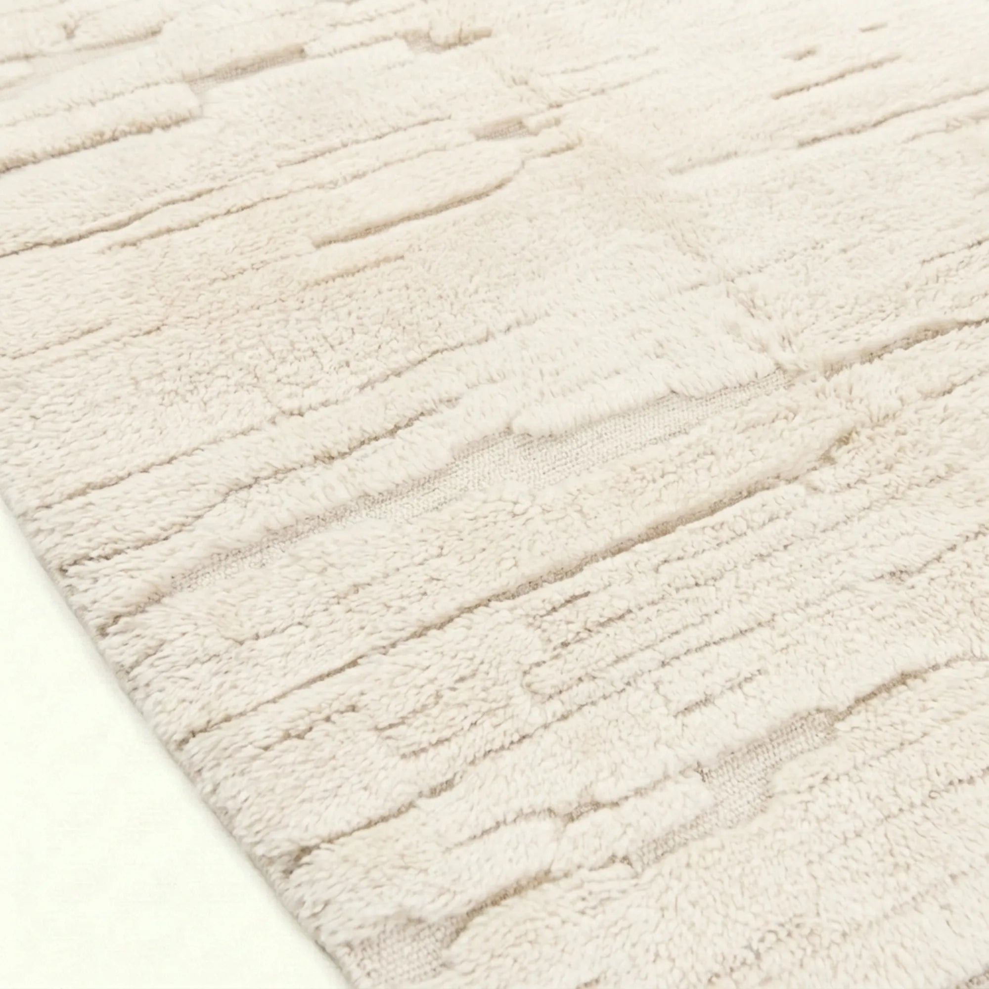 Ivory Mrirt rug Amsiren, subtle linear texture raised pile detail