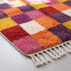 Angled pile detail of Boujaad chequerboard rug showing depth of hand-knotted wool construction
