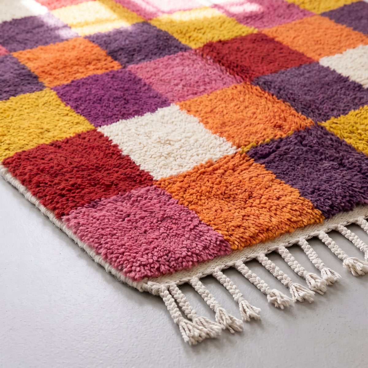Angled pile detail of Boujaad chequerboard rug showing depth of hand-knotted wool construction