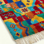 Angled view showing the pattern and wool pile of the Tazdayt Boujaad rug.