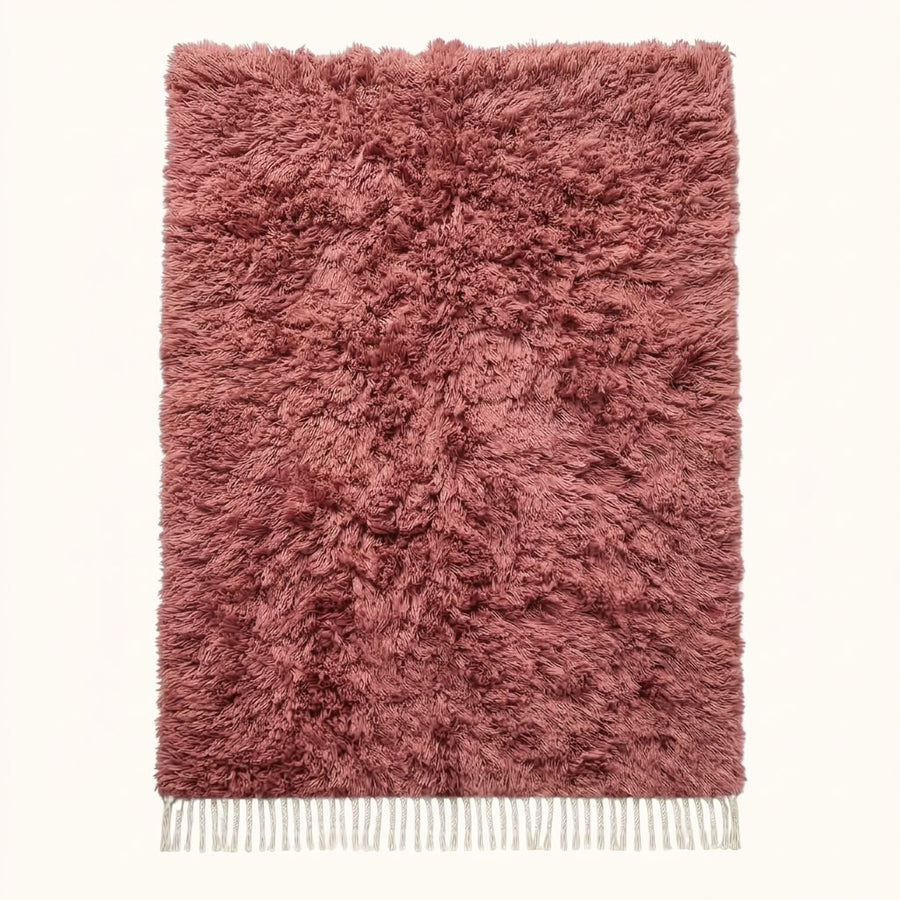 Rose Beni Ourain rug with textured pile and ivory fringe, flat view