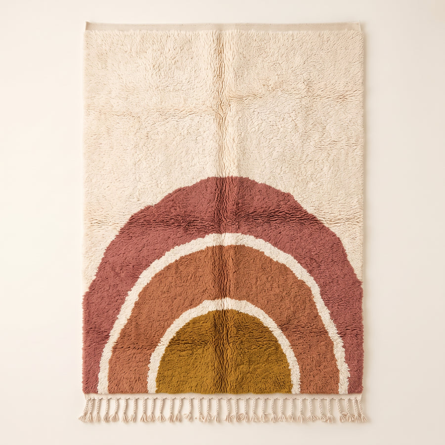 Rose & Ochre Mrirt Rug with nested rainbow arch design on ivory ground, full flat view