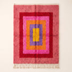 Rose pink, magenta, gold and purple Azilal rug with nested rectangle design, full flat view showing concentric frames around central yellow rectangle
