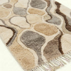Ivory & Taupe Mrirt rug Taznirt, pebble mosaic fringe detail