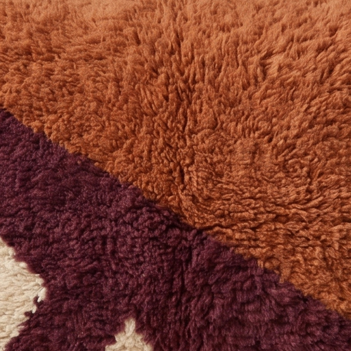 Close-up of the split fields pattern on the Tamurt Moroccan wool pillow