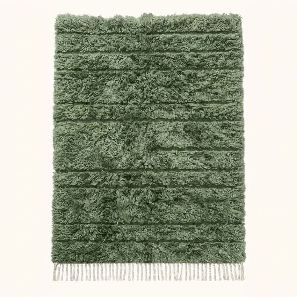 Sage green Beni Ourain rug with cream horizontal bands and thick wool pile, flat lay on white background