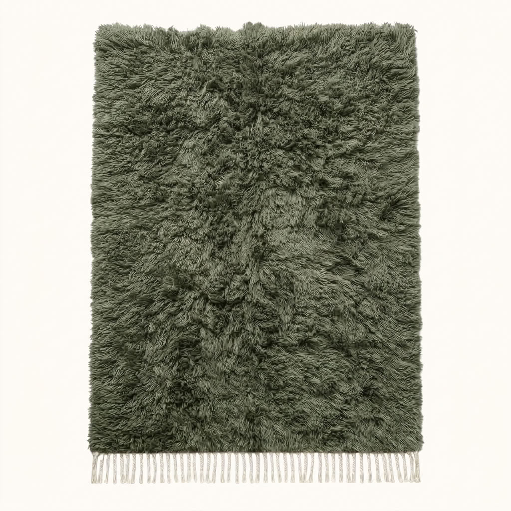 Sage green and ivory Beni Ourain rug Talwit with undyed shag texture, flat lay on plain background