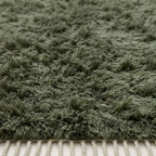 Fringe and edge detail of Talwit Beni Ourain rug showing twisted ivory wool trim and pile structure