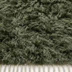 Detailed view of Talwit Beni Ourain rug pile showing organic undyed wool shag and natural colour variation