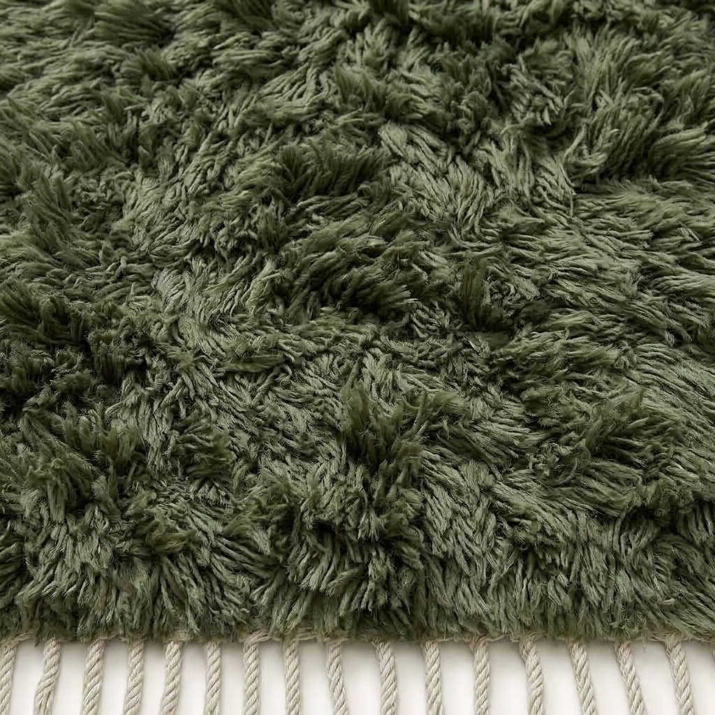 Detailed view of Talwit Beni Ourain rug pile showing organic undyed wool shag and natural colour variation
