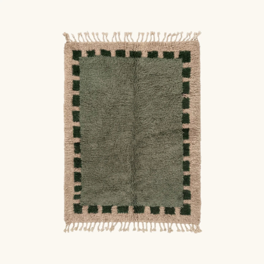 Full view of the Ifru sage green, forest green and ivory Beni Ourain rug with a block border design.