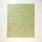 Sage green and ivory Zanafi kilim rug Akalun with minimal linear grid, full rug view