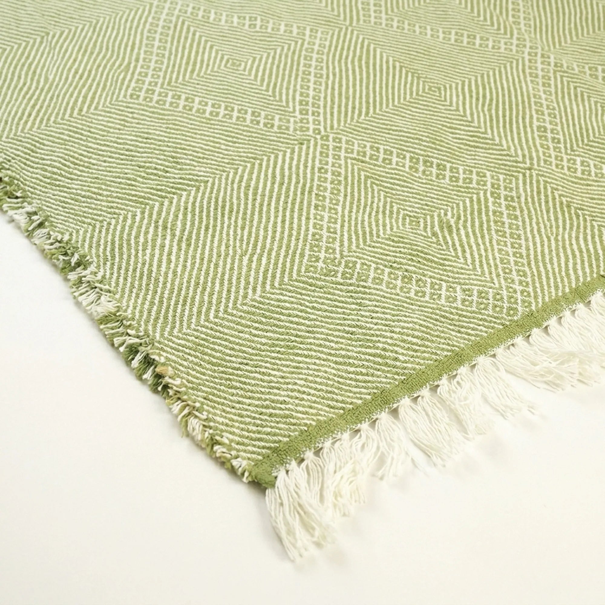 Sage green and ivory Zanafi kilim rug Akalun with minimal linear grid, edge and fringe detail