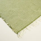 Sage green and ivory Zanafi kilim rug Akalun with minimal linear grid, additional weave detail