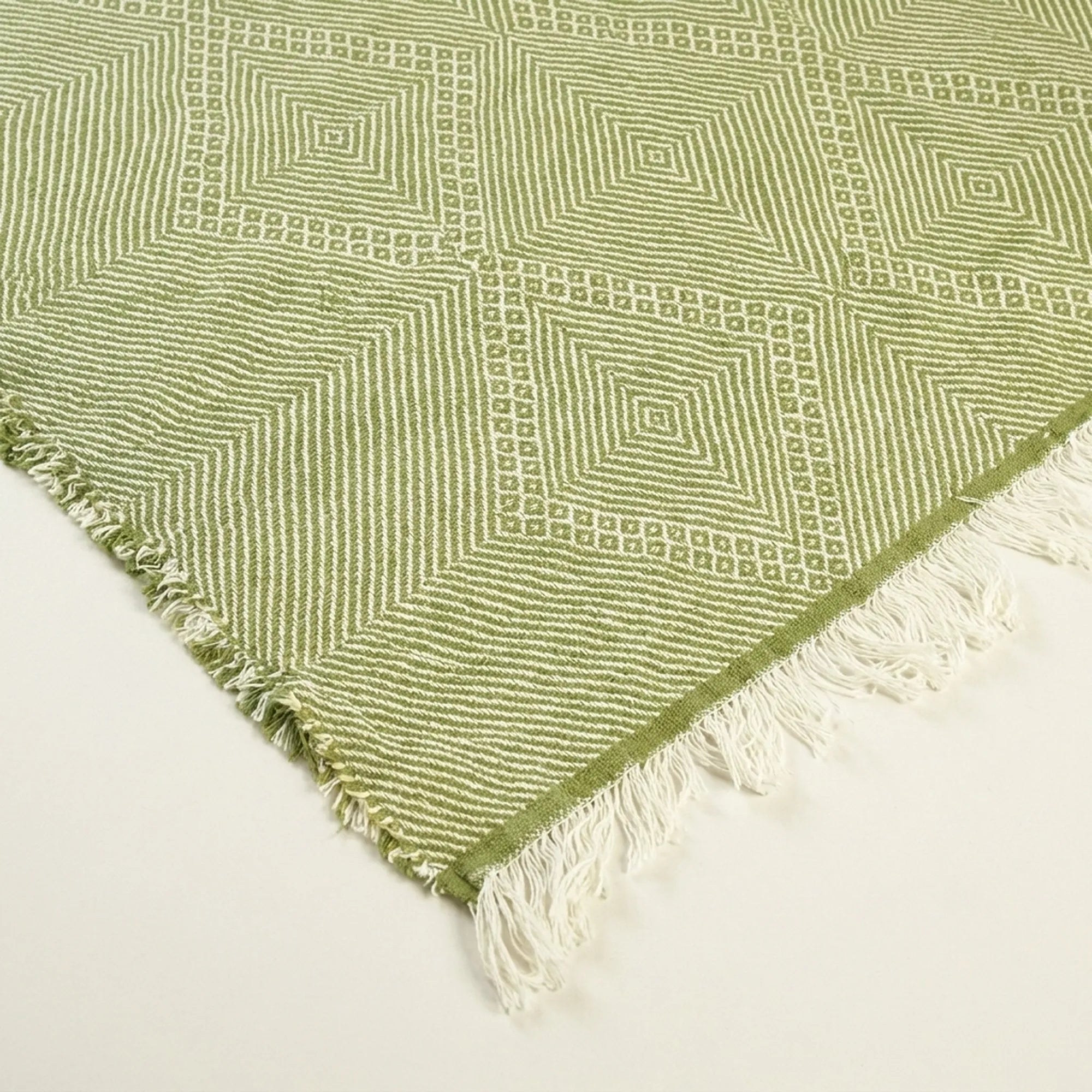 Sage green and ivory Zanafi kilim rug Akalun with minimal linear grid, additional weave detail