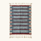 Full view of the Izen slate blue, burgundy and ivory Beni Ourain rug with a horizontal band design.