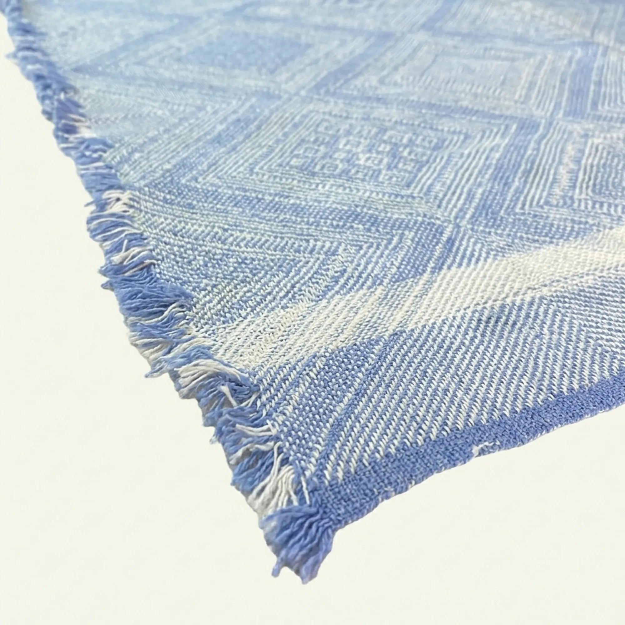 Blue Zanafi Kilim rug Tafraoute with framed diamond pattern, weave and border detail