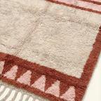 Tanirt blush Beni Ourain rug framed triangle motif detail