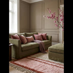 Tanirt blush Beni Ourain rug styled in a refined contemporary interior.