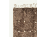 Full patterned surface and fringe of the Targa taupe Moroccan rug.