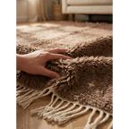 Soft hand-knotted taupe Atlas wool texture and ivory fringe of the Targa rug.