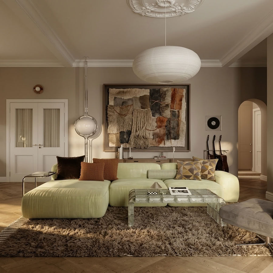 Taupe Beni Ourain rug styled in modern living room with pale green sofa and brass accents