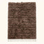 Taupe Beni Ourain rug with dense textured pile and ivory fringe, flat lay on neutral background