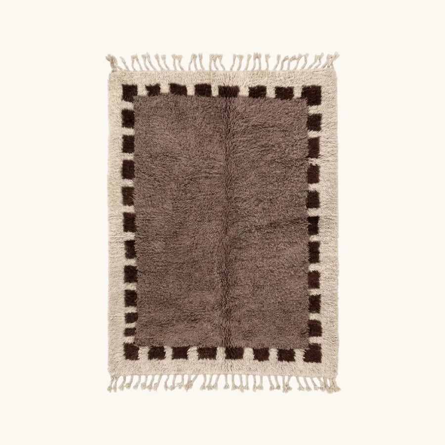 Full view of the Awrir taupe, brown and ivory Beni Ourain rug with a block border design.