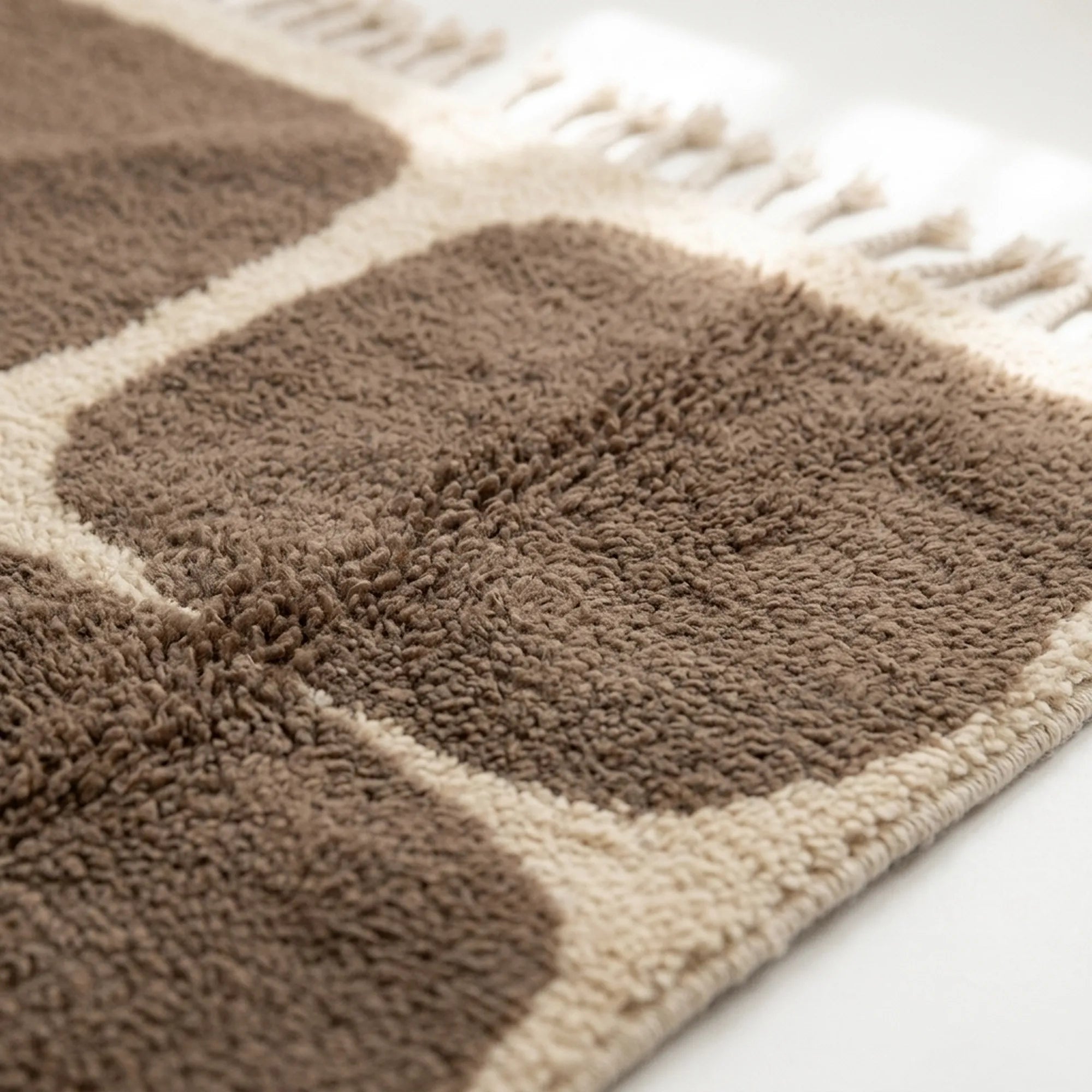Pattern detail of the Asif taupe and ivory rounded grid Beni Ourain rug.