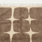 Fringe and edge detail of the Asif taupe and ivory hand-knotted rug.