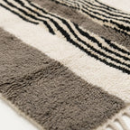 Angled view of the Imal hand-knotted Beni Ourain rug.