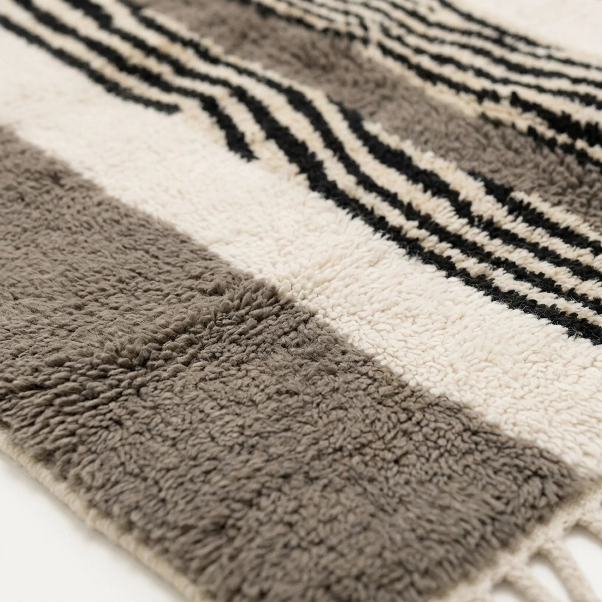 Angled view of the Imal hand-knotted Beni Ourain rug.
