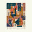 Full view of the Tazmara Boujaad rug in teal, coral, ochre, blush and cream with abstract patchwork symbols