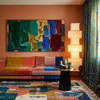 Tazmara Boujaad rug styled in a living room with its colorful abstract patchwork design visible
