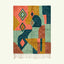 Full view of the Tifawin Boujaad rug in teal, coral, ochre and sage with oversized abstract diamond color blocks