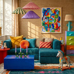 Tafraout Boujaad rug styled in a colorful interior with its teal, cream and orange abstract design visible