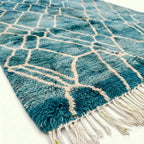 Teal and ivory Mrirt rug Afer raised wool texture detail