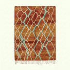 Terracotta and aqua Mrirt rug Amsaw with organic lattice pattern, full rug view
