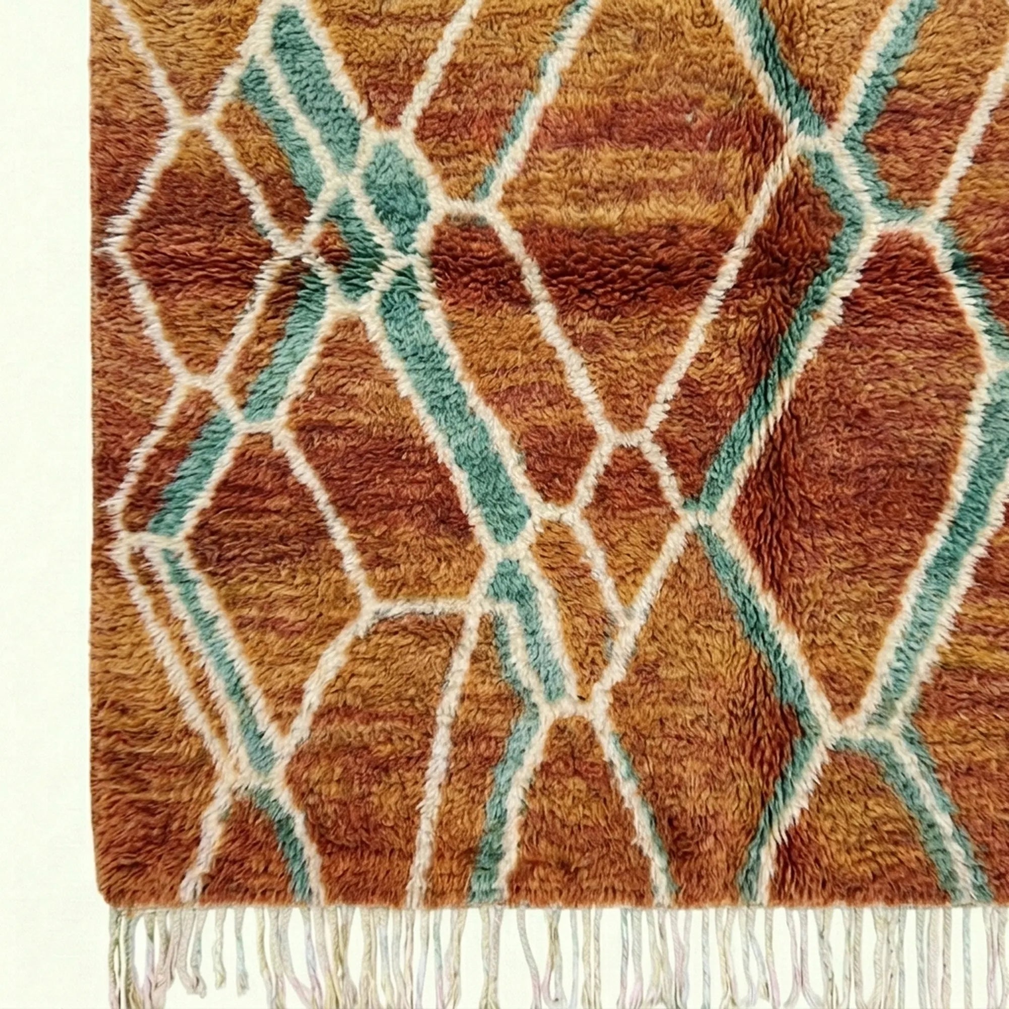 Terracotta and aqua Mrirt rug Amsaw organic lattice wool detail