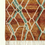Terracotta and aqua Mrirt rug Amsaw raised pile detail