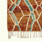 Terracotta and aqua Mrirt rug Amsaw fringe and pile detail