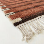 Close-up of the natural Atlas wool texture on the Tiziri rug.
