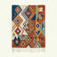 Full view of the Ayyur terracotta, cream and teal Boujaad rug with an oversized diamond and linear design.