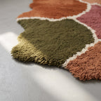 Corner detail of Talwit Azilal rug showing organic edge and wavy outline characteristic of hand-drawn design